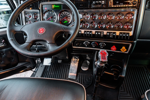 Kenworth W900 interior showing Steering Wheel Handle, Shifter Handle and Chrome Pedal Set