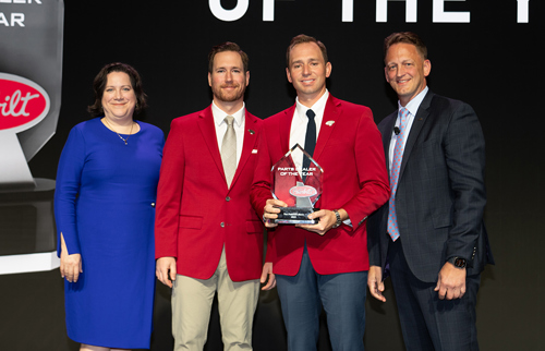 The Peterbilt Store receiving the 2023 Peterbilt Parts Dealer of the Year Award